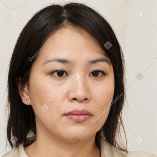 Neutral asian young-adult female with medium  brown hair and brown eyes