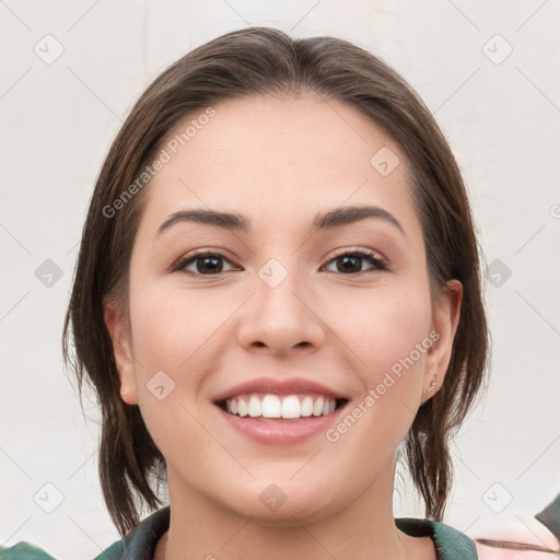 Joyful white young-adult female with medium  brown hair and grey eyes