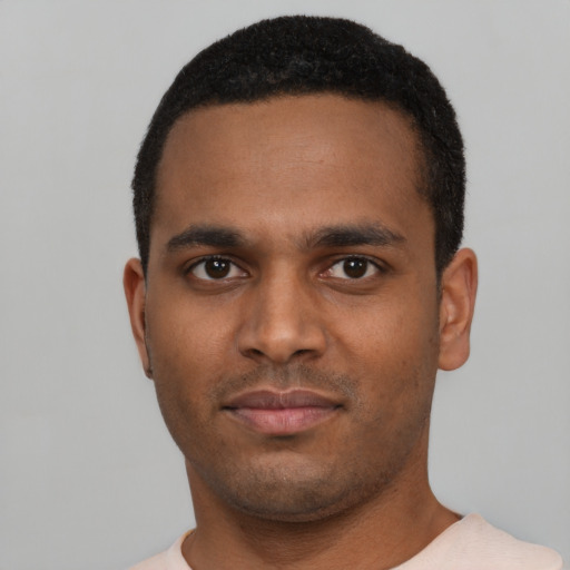 Neutral black young-adult male with short  black hair and brown eyes