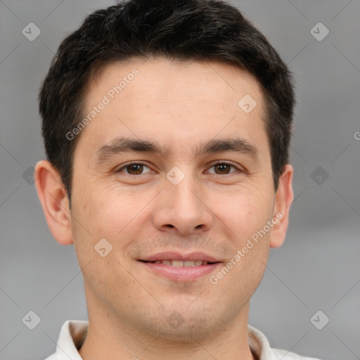 Joyful white young-adult male with short  brown hair and brown eyes