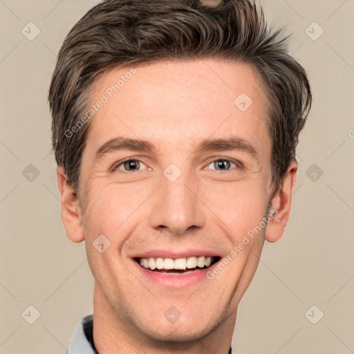 Joyful white adult male with short  brown hair and grey eyes