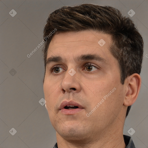 Neutral white young-adult male with short  brown hair and brown eyes