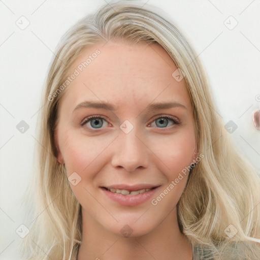 Joyful white young-adult female with long  brown hair and blue eyes