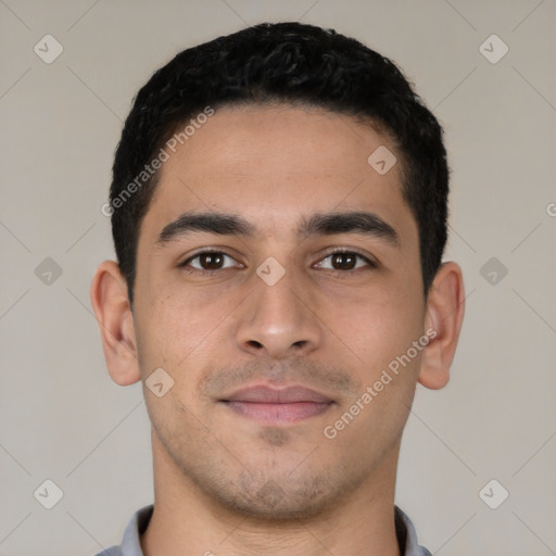 Neutral latino young-adult male with short  black hair and brown eyes