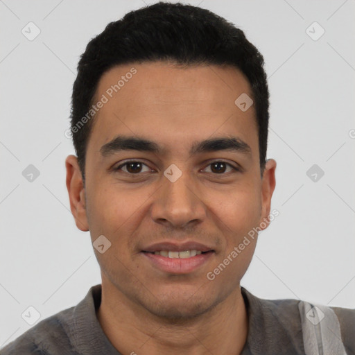 Joyful latino young-adult male with short  black hair and brown eyes