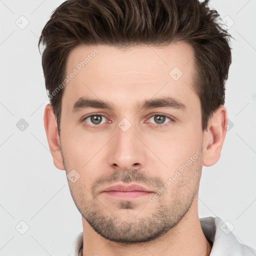 Neutral white young-adult male with short  brown hair and brown eyes