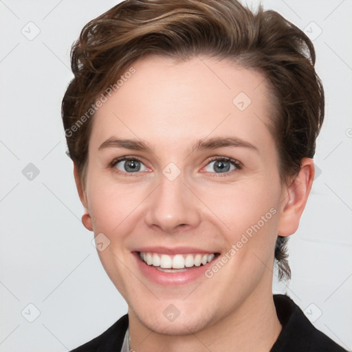 Joyful white young-adult female with short  brown hair and grey eyes