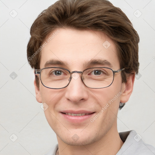 Joyful white adult male with short  brown hair and grey eyes