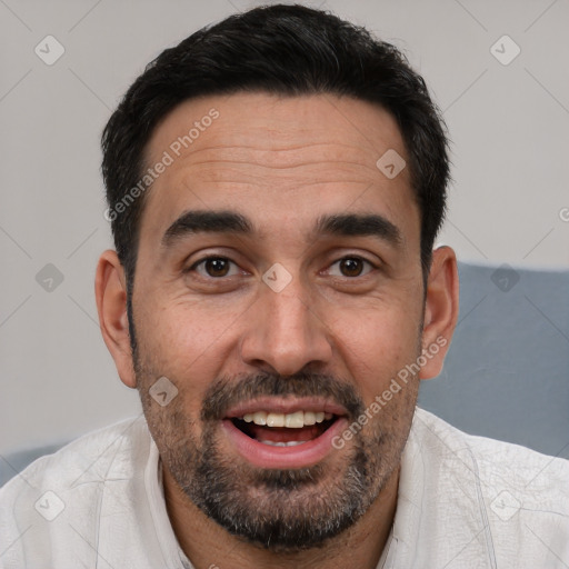 Joyful white adult male with short  brown hair and brown eyes