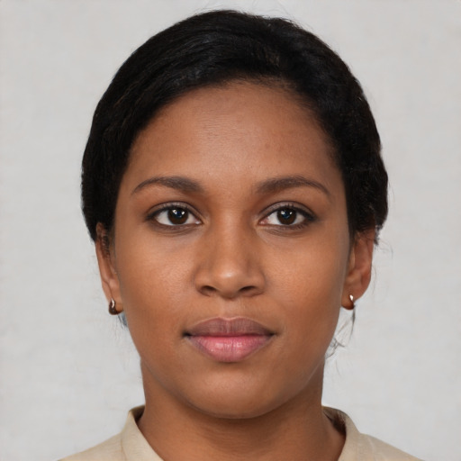 Neutral black young-adult female with short  black hair and brown eyes