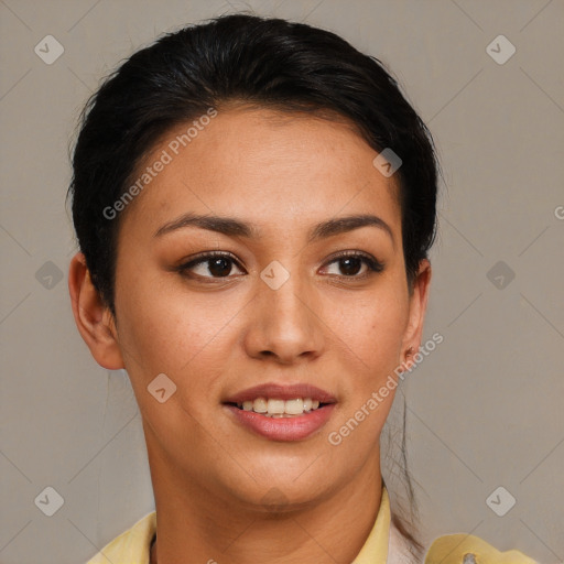 Joyful latino young-adult female with short  brown hair and brown eyes