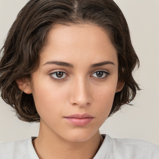 Neutral white young-adult female with medium  brown hair and brown eyes