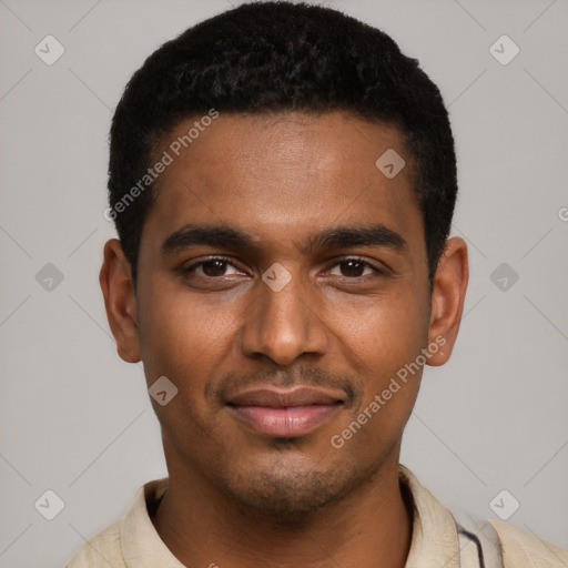 Joyful black young-adult male with short  black hair and brown eyes