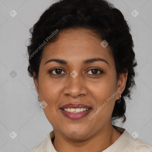 Joyful latino adult female with short  brown hair and brown eyes