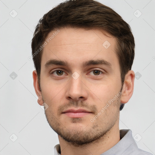 Neutral white young-adult male with short  brown hair and brown eyes