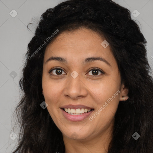 Joyful latino young-adult female with long  brown hair and brown eyes