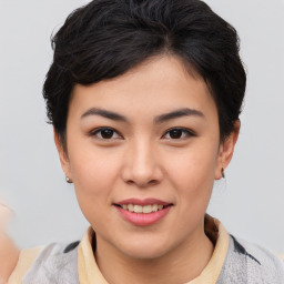 Joyful asian young-adult female with short  brown hair and brown eyes