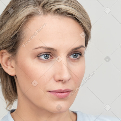 Neutral white young-adult female with medium  brown hair and blue eyes