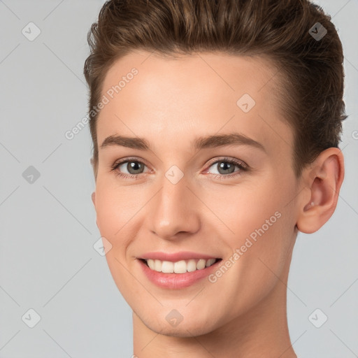 Joyful white young-adult female with short  brown hair and brown eyes