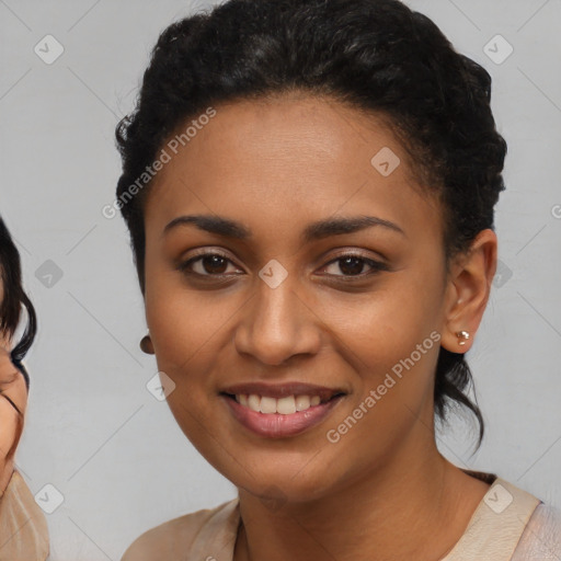 Joyful latino young-adult female with medium  brown hair and brown eyes