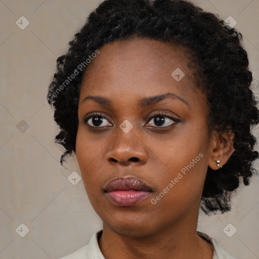 Neutral black young-adult female with medium  black hair and brown eyes