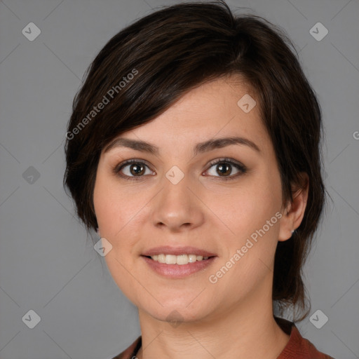 Joyful white young-adult female with medium  brown hair and brown eyes