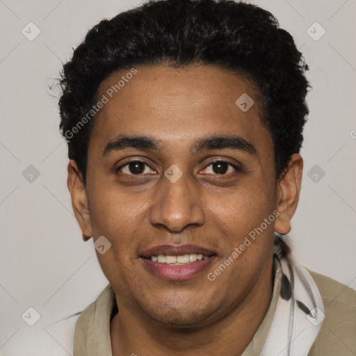 Joyful black young-adult male with short  black hair and brown eyes
