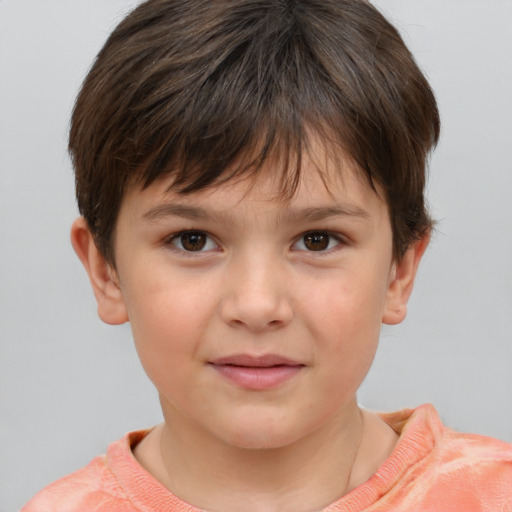 Joyful white child female with short  brown hair and brown eyes