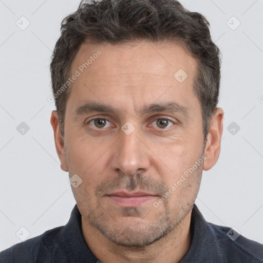 Neutral white adult male with short  brown hair and brown eyes