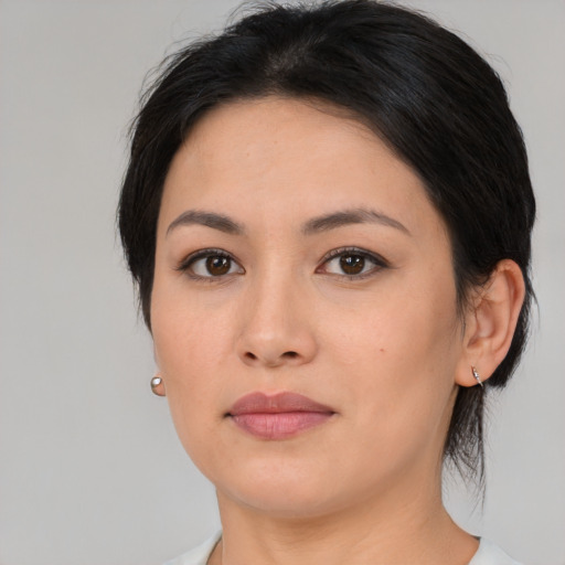 Neutral asian young-adult female with medium  black hair and brown eyes