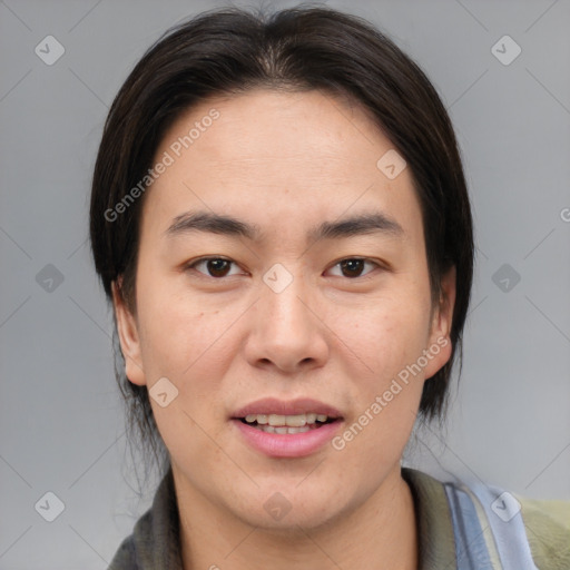 Joyful asian young-adult female with medium  brown hair and brown eyes