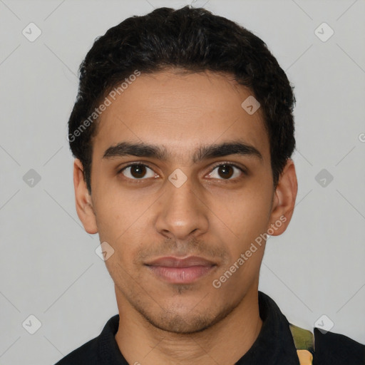 Neutral latino young-adult male with short  black hair and brown eyes