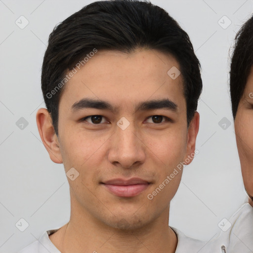 Joyful asian young-adult male with short  brown hair and brown eyes