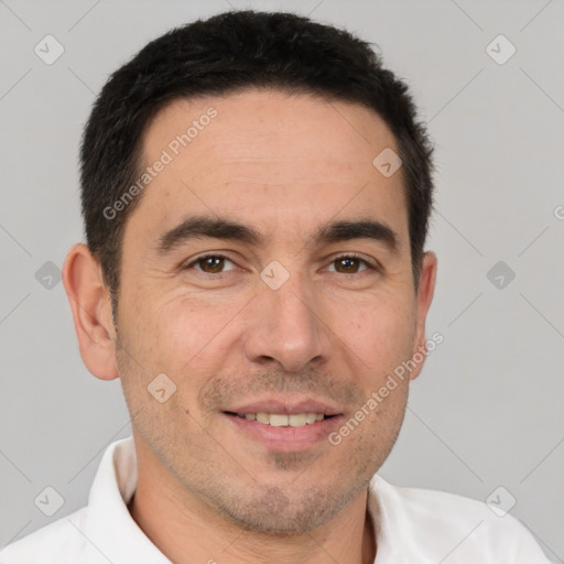 Joyful white adult male with short  brown hair and brown eyes