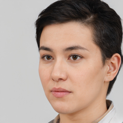 Neutral white young-adult female with short  black hair and brown eyes