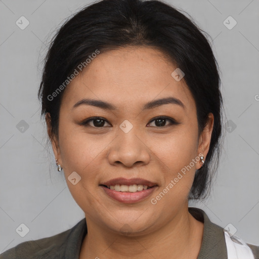 Joyful asian young-adult female with medium  black hair and brown eyes