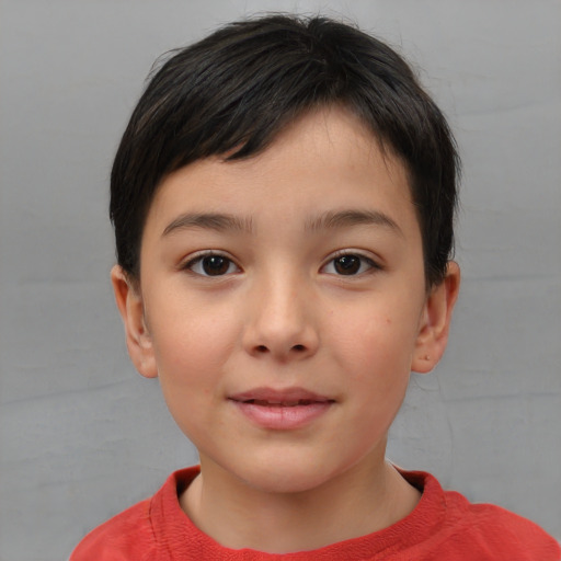 Joyful white child female with short  brown hair and brown eyes