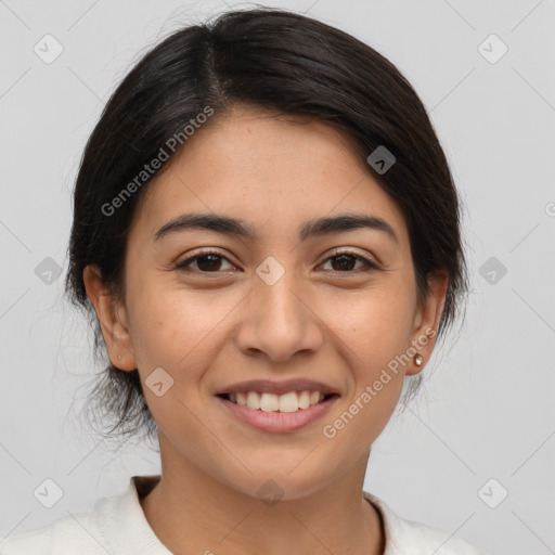 Joyful latino young-adult female with medium  brown hair and brown eyes