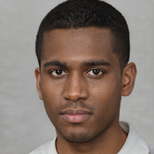 Neutral black young-adult male with short  brown hair and brown eyes