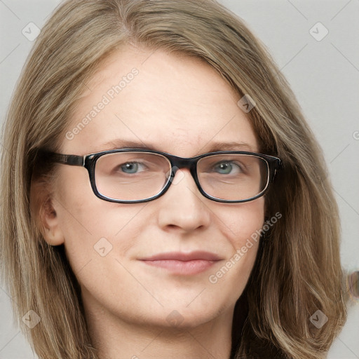 Joyful white young-adult female with long  brown hair and blue eyes