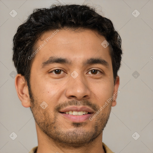 Joyful latino young-adult male with short  brown hair and brown eyes