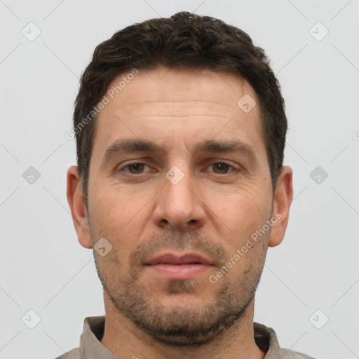 Neutral white adult male with short  brown hair and brown eyes