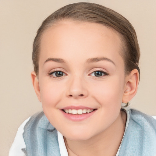 Joyful white child female with long  brown hair and brown eyes