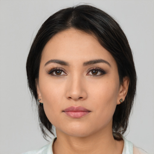 Neutral latino young-adult female with medium  black hair and brown eyes