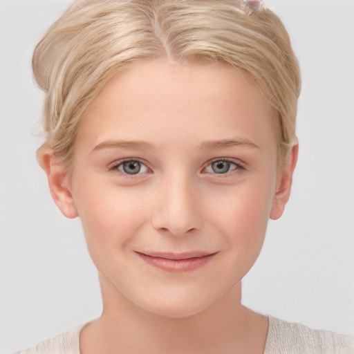 Joyful white child female with short  blond hair and blue eyes