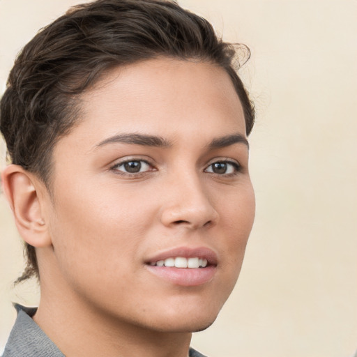 Joyful white young-adult female with short  brown hair and brown eyes