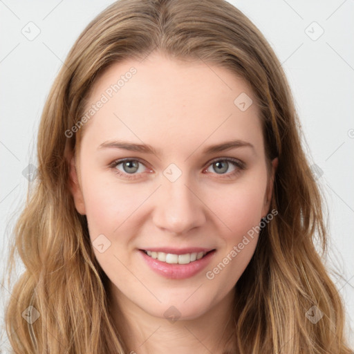 Joyful white young-adult female with long  brown hair and blue eyes