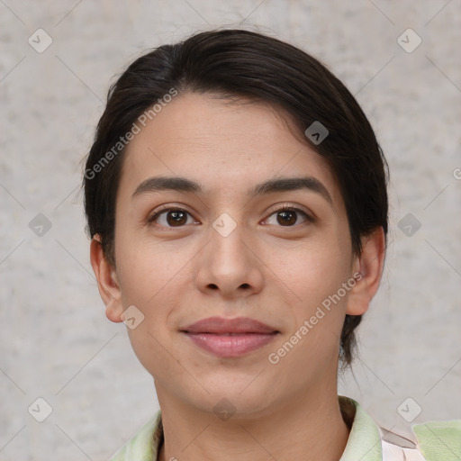 Joyful white young-adult female with short  brown hair and brown eyes