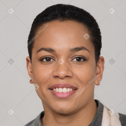 Joyful latino young-adult female with short  black hair and brown eyes