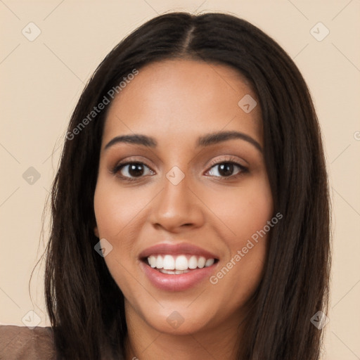 Joyful white young-adult female with long  black hair and brown eyes